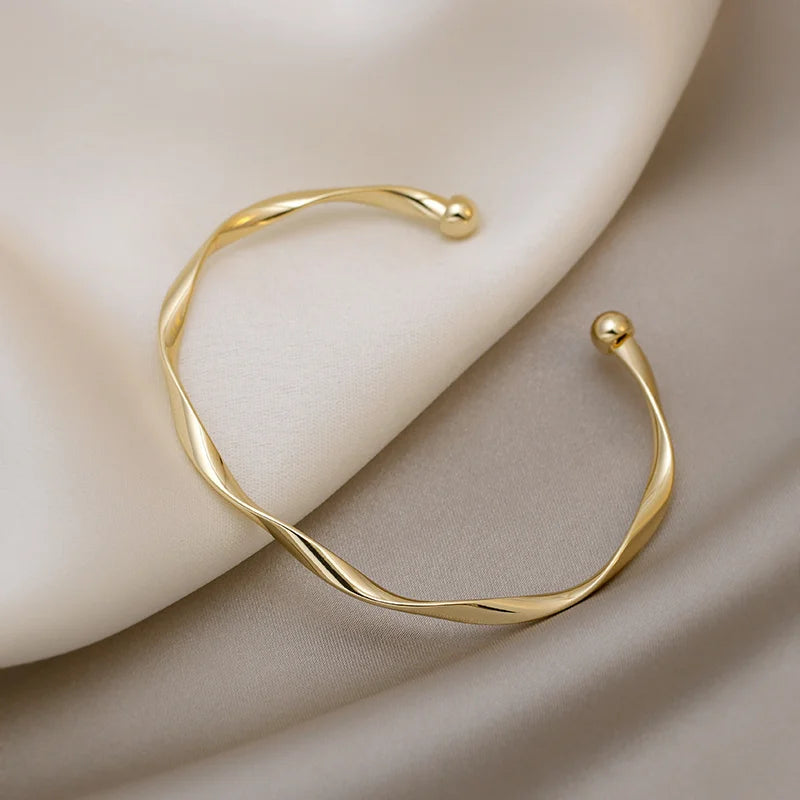 Gold Glossy Twisted Open Bangle