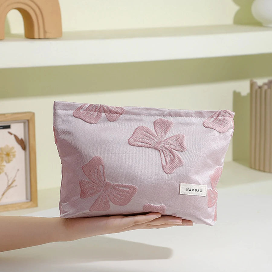 Pink Bow Makeup Bag: Large capacity, portable clutch for cosmetics and toiletries